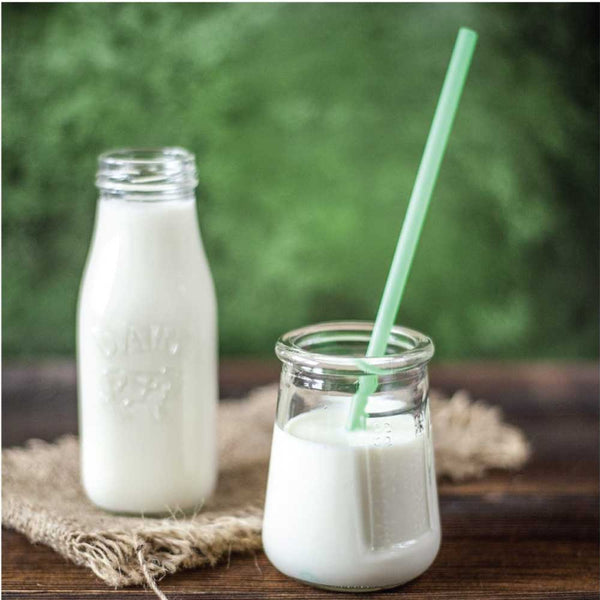milk-in-glass-jar-with-sroll